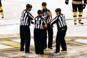 NHL officials huddle