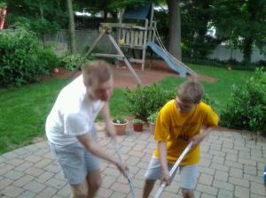 Ryan and C. playing hockey